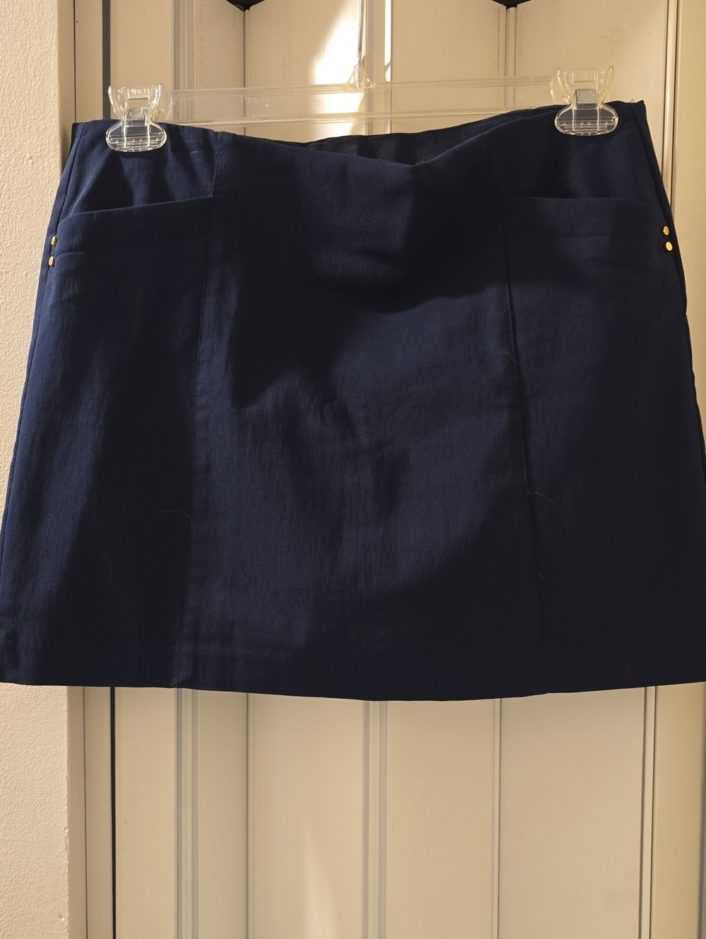 Attyre Navy Mini Skort with Gold Studs And Front Pockets